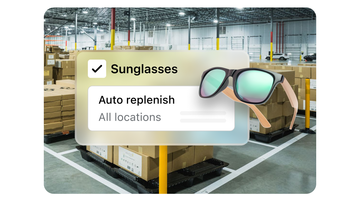 Boxes on pallets in a storage facility, with overlay text in the middle of the image showing the option to auto replenish sunglasses to all fulfillment locations for Amazon Prime Day 2023.